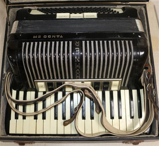 A Hohner Tango 2M piano accordian